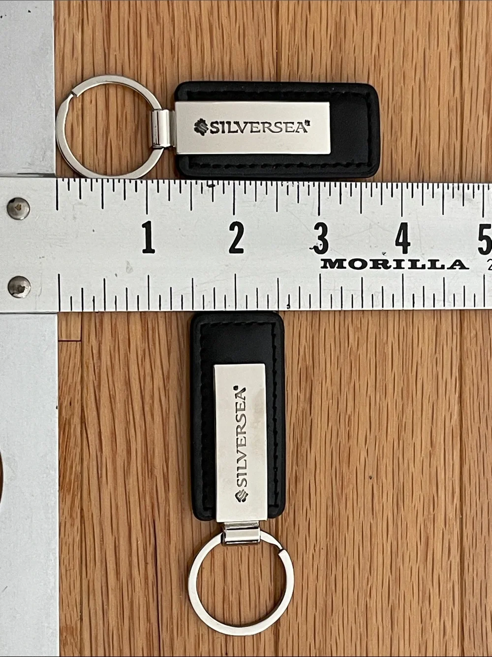 Silversea NEW Boxed Black Leather Keychains with Silver Metal Plate - Pair